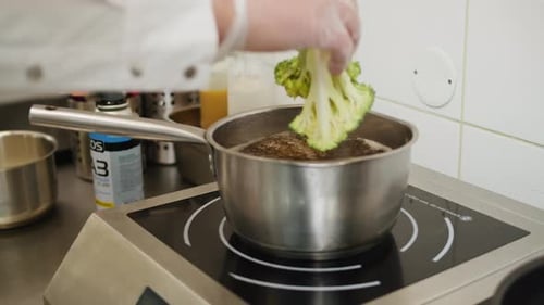 Professional Restaurant Kitchen Green Broccoli Boiling in Water Closeup Healthy Organic Vegetable