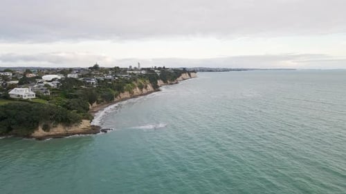 Aerial flight along the beautiful coast of Narrow Neck, New Zealand
