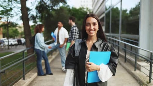 Smiling Young Adult on College Campus