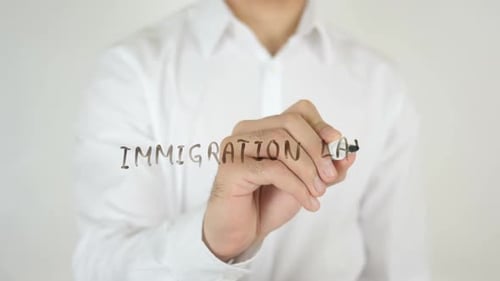 Writing Immigration Law With Marker Close Up