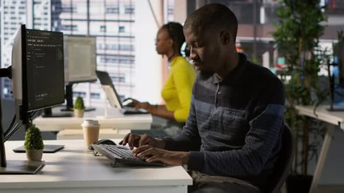 Programmer Doing Software Debugging Asking for Help From Smiling Team Leader