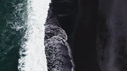 The Black Sand Beach in Iceland Sea Aerial View and Top View