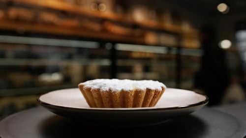 Close-up, bakery - delicious bun - cake on a rotating surface