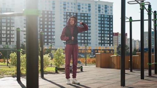 Jogger Stretching One Arm Outdoor Urban Park Autumn Workout Warm Up