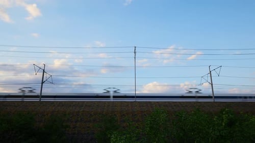 High Speed Fast Train Passenger Locomotive In Motion At The Railway