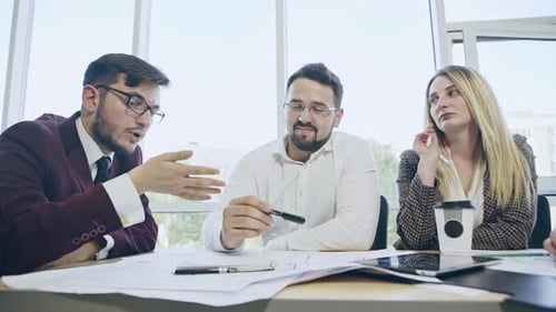 Team Meeting in Bright Modern Office
