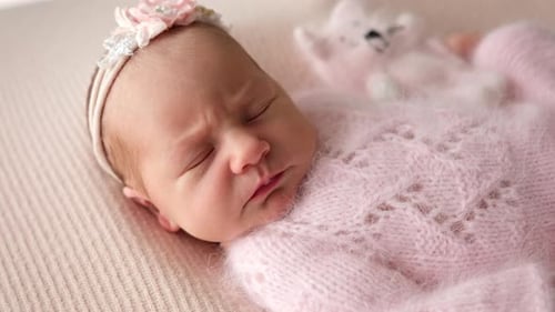 Close Up Portrait Of Adorable Newborn Baby Girl