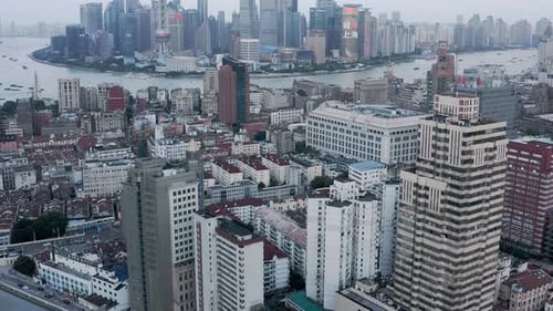 Shanghai business district reveal from downtown city suburb, aerial view