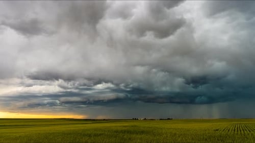 Storm Clouds Rolling Over Vast Field