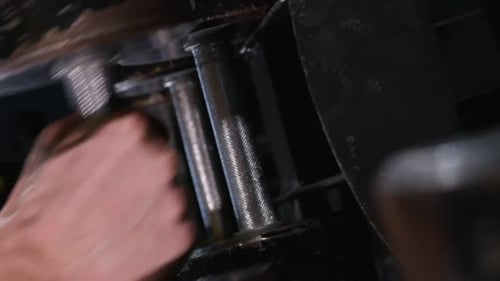 Vertical Video Male Hands Taking Bodybuilding Dumbbells in Gym Club