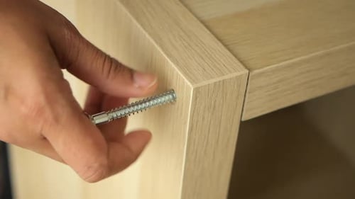 Assembling Furniture with a Screw Wood and Tools