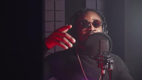 Professional Rap Performer or Voice Actor in Recording Studio Portrait of African American Singer