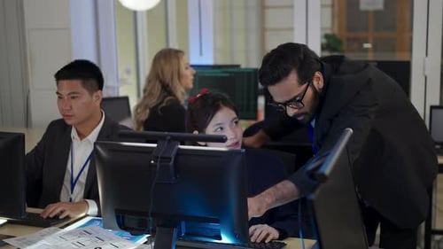 Group of programmers are coding at office.