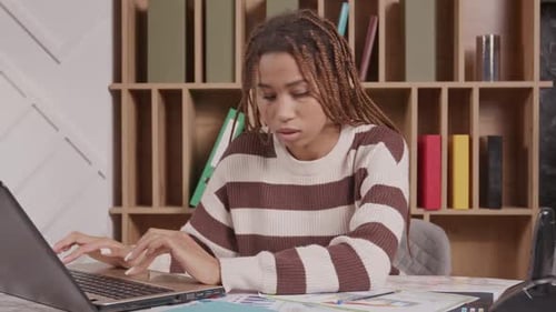 Smart Black Female College Student with Laptop Working on University Project