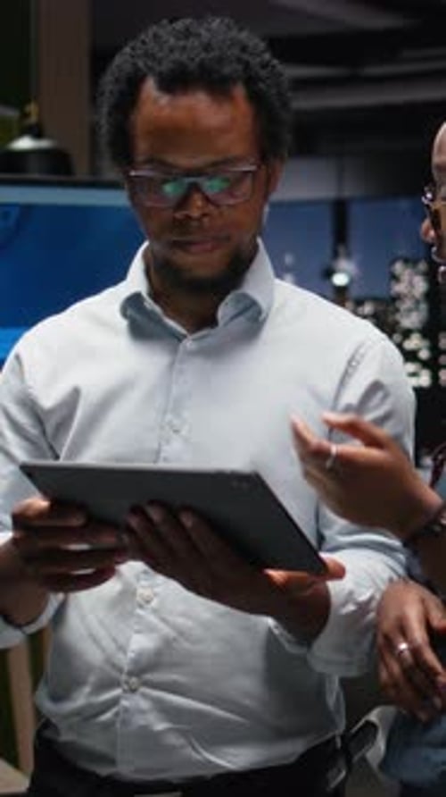 Vertical Video Engineering Team in Office Analyzing Machine Learning Algorithms