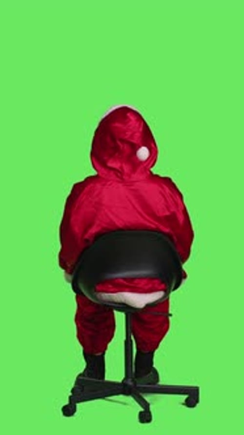Vertical Video Back View of Santa Claus Embodiment Poses on Chair