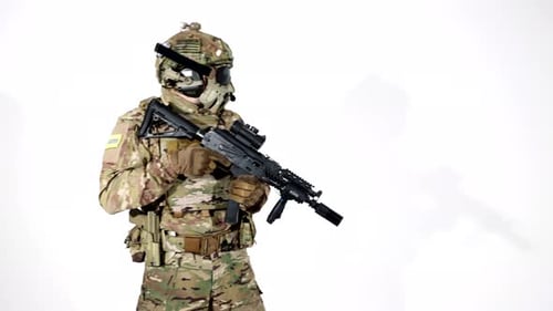 Camouflaged Soldier Reloads Weapon on White Background