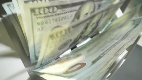 Close Up Cash Counting Machine Counting Money Banknotes of 100 Dollar Bills Money Count Machine