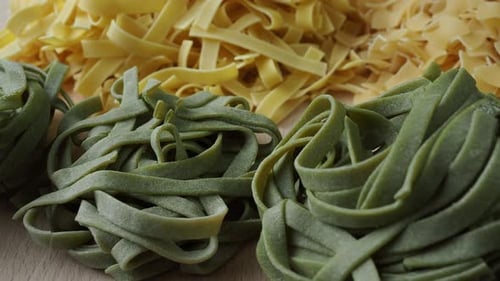 Close Up of Green and Yellow Uncooked Pasta