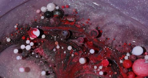Abstract Red, Black, and White Spheres in Liquid