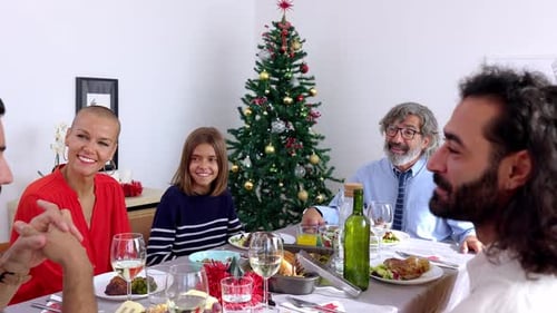 Festive Family Gathered for Christmas Celebration