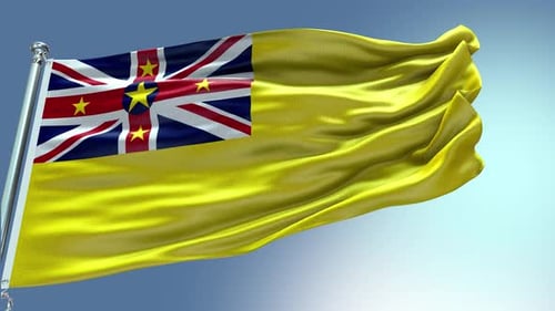Niue National Flag Waving Proudly in the Wind