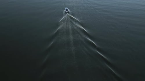 Aerial view of a speedboat navigating open water