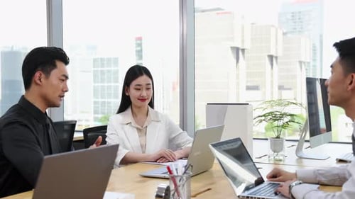 Business Professionals Meeting in a Modern Office Space