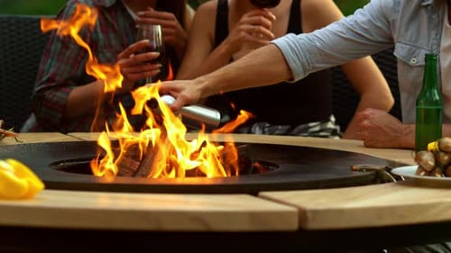 Closeup Man Chef Hands Preparing Bbq Grill for Cooking Food Outdoors. Unknown