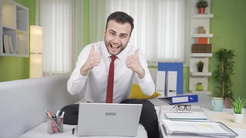 Man Celebrates Good News While Working From Home