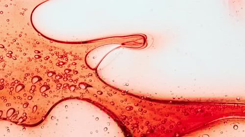 Dynamic Red Fluid Flow with Bubbles Abstract Motion