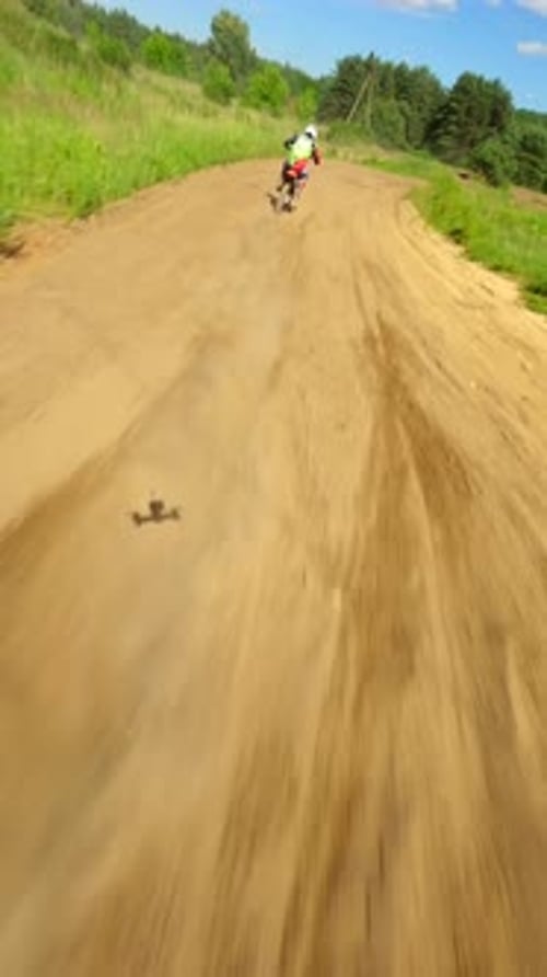 Motorcycle Riding on a Country Dirt Road