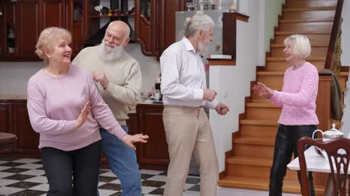 Senior Friends Dancing and Celebrating Together