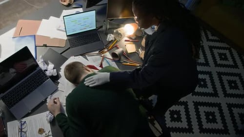Young Black Female Detective Agent Working at Murder Scene in Office