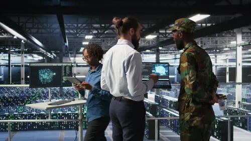 Army Technicians in Command Center Server Room Using Artificial Intelligence