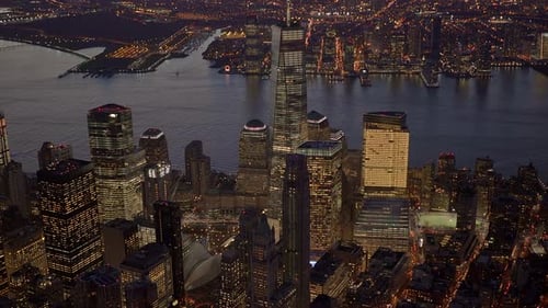 Stunning Aerial View of NYC Skyline with Iconic Skyscrapers By Hudson River at Dusk