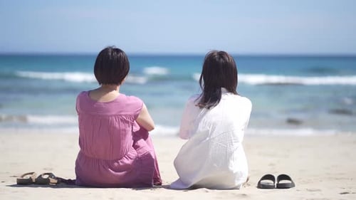 woman talking on the beach