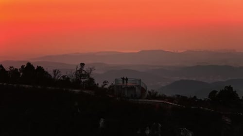 Sunrise Over Mountain Range with Distant Skyline