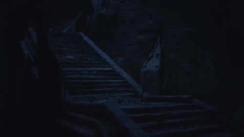 Dark Ruined Stone Staircase in Eerie Ancient Cave Environment