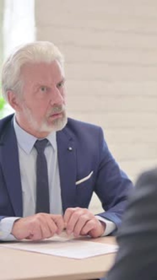Senior Old Businessman Discussing Work with Businessman in Office, vertical video