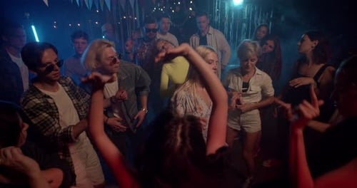 Group of Friends Dancing at an Outdoor Party