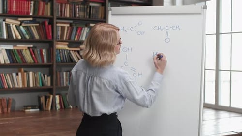 Online Education by Female Teacher at University Library Interior. Woman Writing On