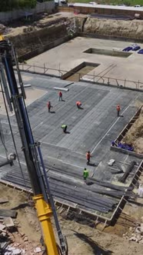 Construction Workers on an Urban Construction Site
