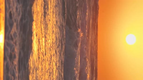 Vertical Shot Sun Shine Above Sea Ocean During Sunset