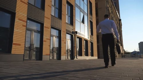 Man Walking to Work with Briefcase