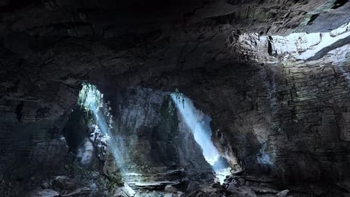 A Cave Filled with Lots of Rocks and Water