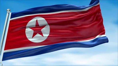 North Korea Flag Waving Loop Against Blue Sky
