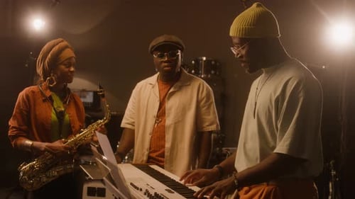 African American Blues Band Composing New Song in Studio