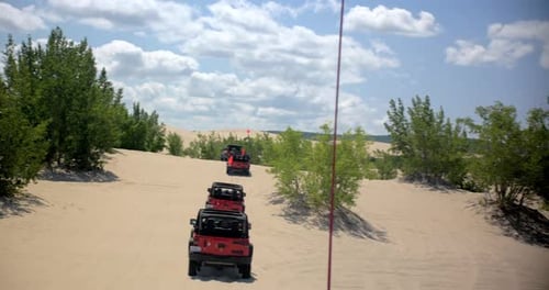 Jeeps enjoying extreme off roading adventure on the dunes of silver lake state park Michigan