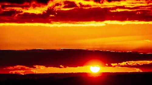 Majestic Sunset Time Lapse Over Dark Landscape